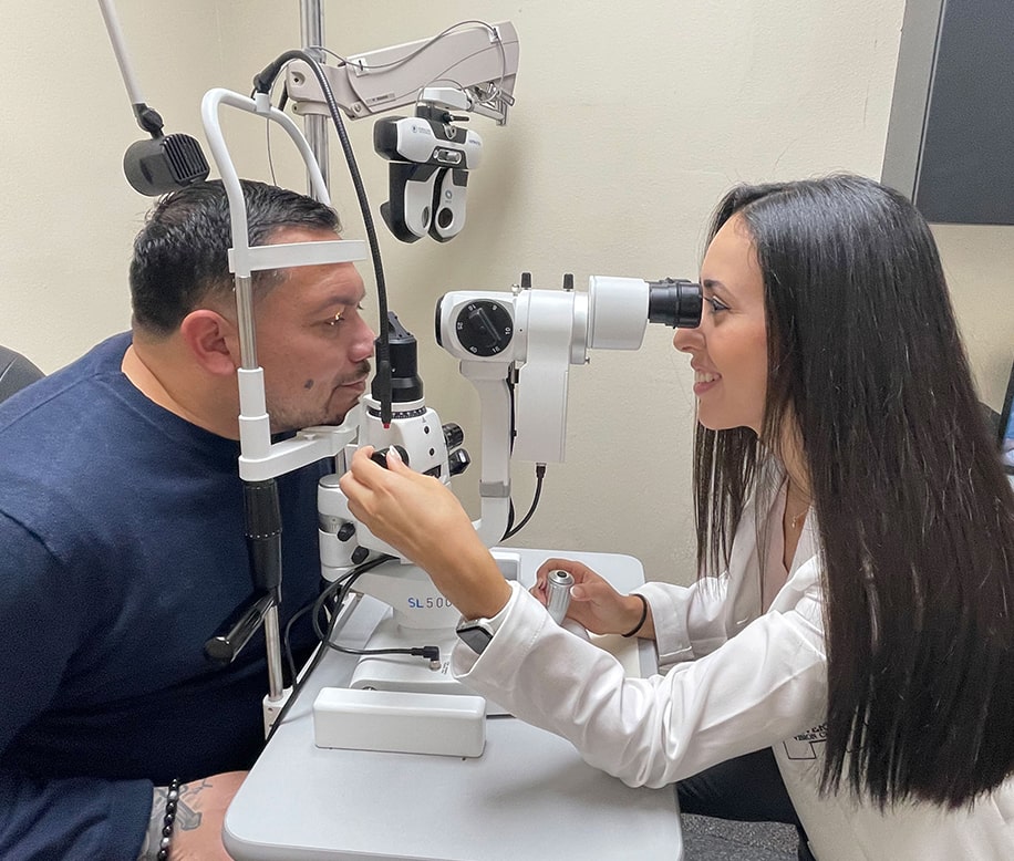 eye exam with patient and doctor