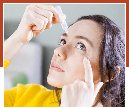 Woman eye drops and dry eye treatment