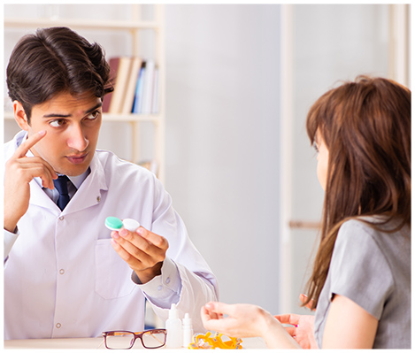 Eye doctor and a girl at an eye exam