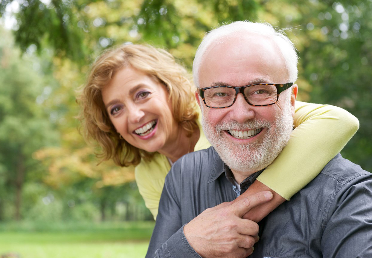 Smiling middle-aged couple.
