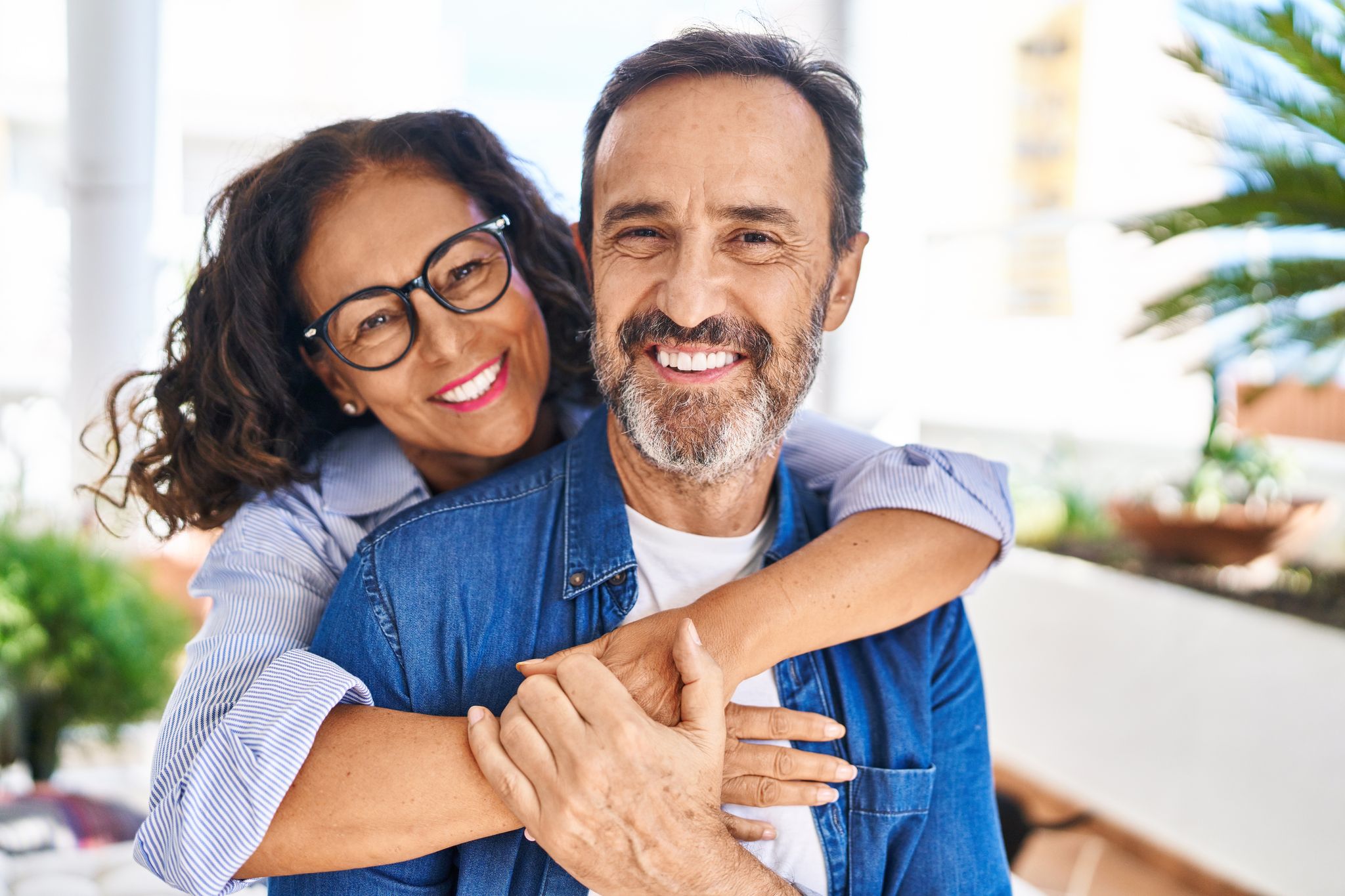 Smiling middle-aged couple.